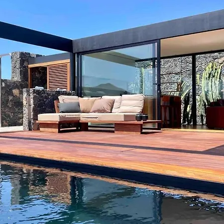 Wake Up To Nature In Modern Glass House Villa