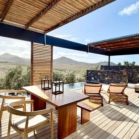 Wake Up To Nature In Modern Glass House Villa